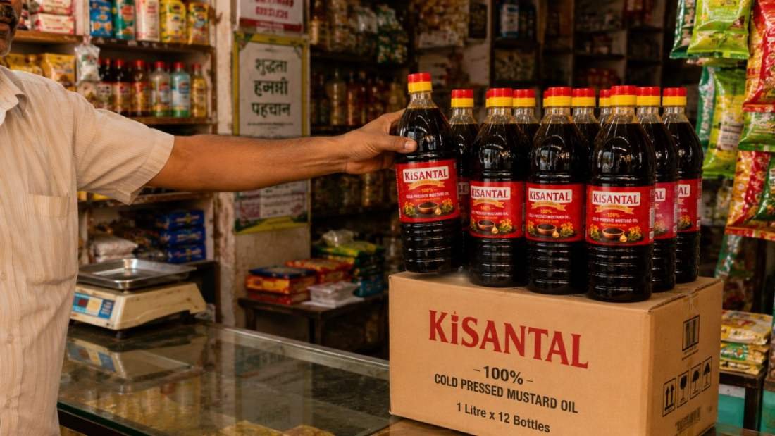 Case of twelve Kisantal mustard oil bottles at a kirana store